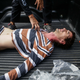 A wounded protestor receives medical assitance from emergency staff